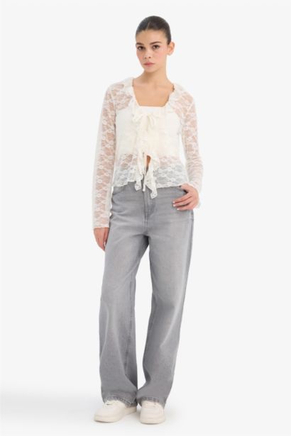 Blouse en dentelle à col en V et manches longues Coupe ajustée