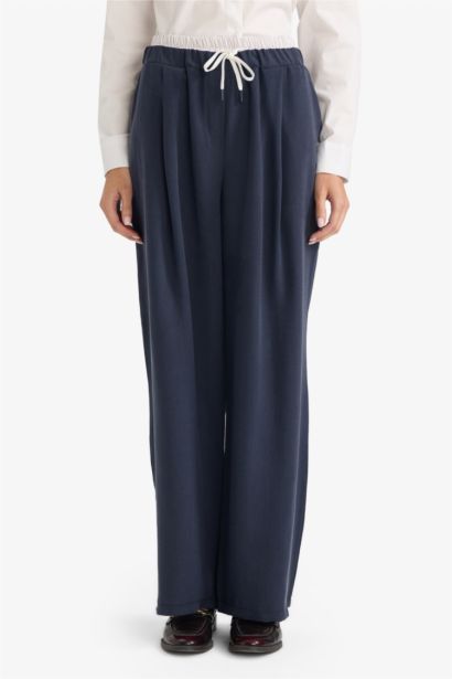 بنطلون باجي فيت بخصر عادي وجيوب