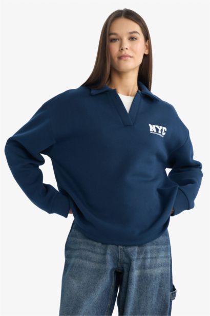 سويت شيرت بياقة بولو وقصة واسعة أوفر سايز