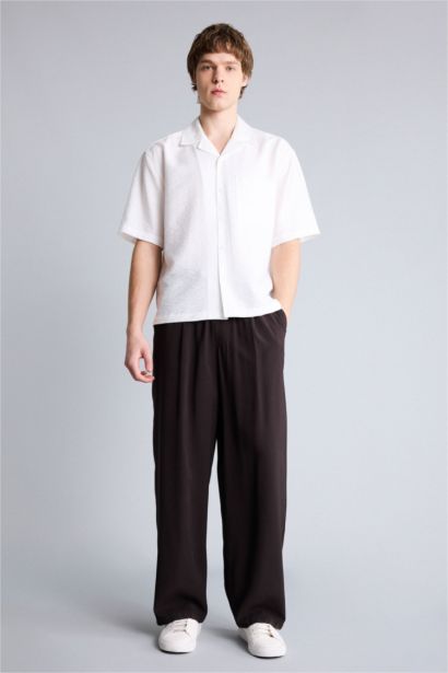 Chemise boxy en tissu froissé à manches courtes