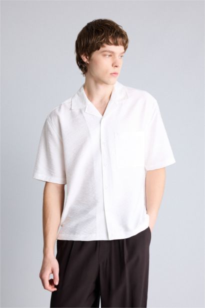 Chemise boxy en tissu froissé à manches courtes