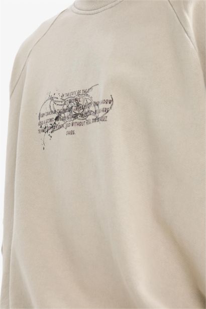 سويت شيرت اوفر سايز بياخة مستديرة