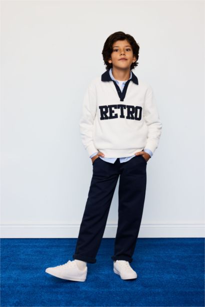 سويت شيرت ولادي اوفر سايز بطبعة شعار وياخة بولو