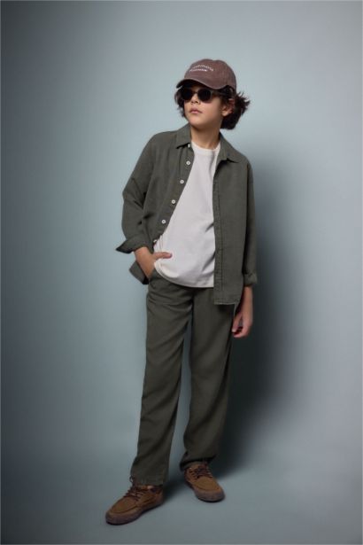 بنطرون ولادي قماش ايوسل قصة عادية ورجل عادي