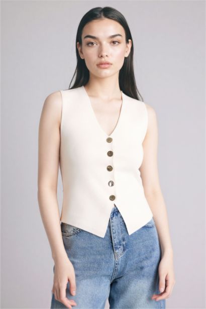 Жилет приталенного кроя из трикотажа для женщин