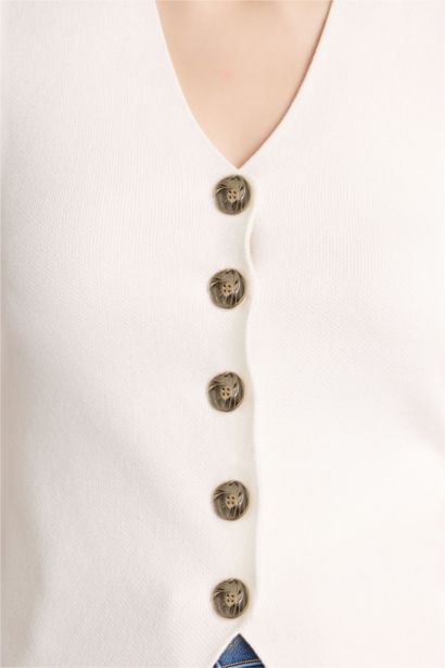 Жилет приталенного кроя из трикотажа для женщин