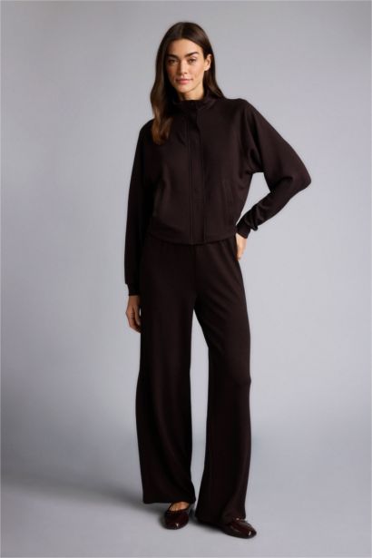 جاكيت قصة مريحة بياقة عالية بسحاب