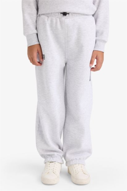 بنطلون سويت بانتس اولادي تقيل بطبعة شعار اوفر سايز