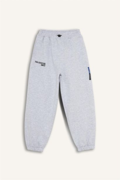 بنطلون سويت بانتس اولادي تقيل بطبعة شعار اوفر سايز