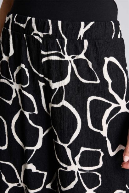 بنطلون منسوج وايد ليج برجل واسع