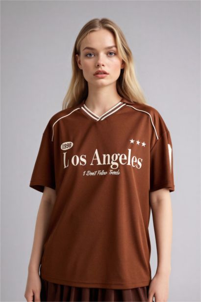 Футболка оверсайз с воротником поло принтом и коротким рукавом