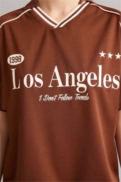 Футболка оверсайз с воротником поло принтом и коротким рукавом