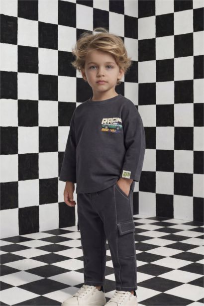 تيشيرت كم طويل بطبعة شعار اوفر سايز برقبة مستديرة