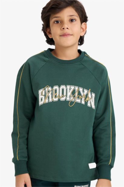 تيشيرت اولادي كم طويل قماش خفيف اوفر سايز