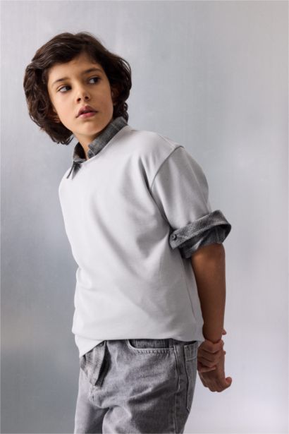 تيشيرت ولادي نص ردن اوفر سايز بياخة مستديرة