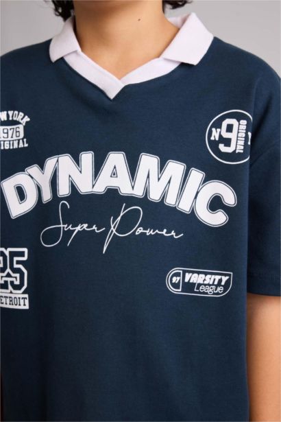 تيشيرت بولو نص ردن بطبعة شعار اوفر سايز وياخة عالية