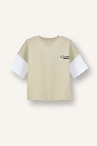 تيشيرت بيبي اولادي اوفر سايز نص كم بطبعة شعار