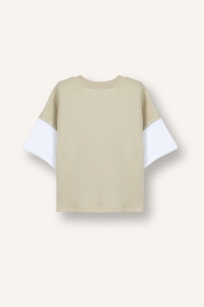 تيشيرت بيبي اولادي اوفر سايز نص كم بطبعة شعار