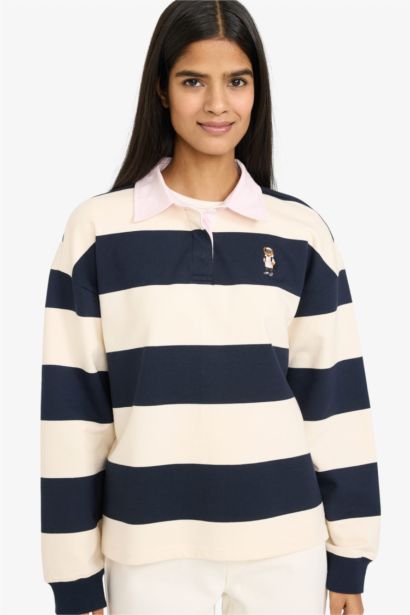 سويت شيرت قصة فضفاضة بياقة بولو