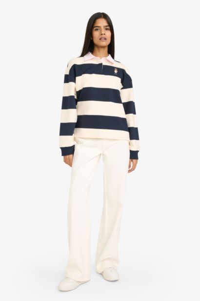 سويت شيرت قصة فضفاضة بياقة بولو