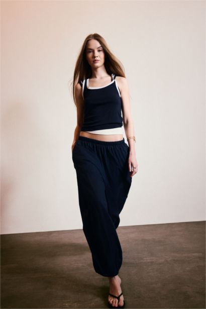 فانيلة مضلع مخصر سليم فيت بياخة U