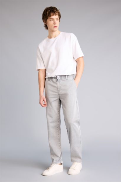 Джинсы Wide Leg с широкими штанинами и снежной стиркой