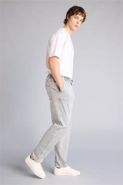 Джинсы Wide Leg с широкими штанинами и снежной стиркой