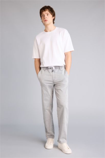 Джинсы Wide Leg с широкими штанинами и снежной стиркой