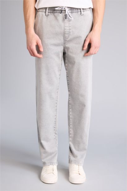 Джинсы Wide Leg с широкими штанинами и снежной стиркой