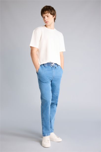 Джинсы Wide Leg с широкими штанинами и снежной стиркой