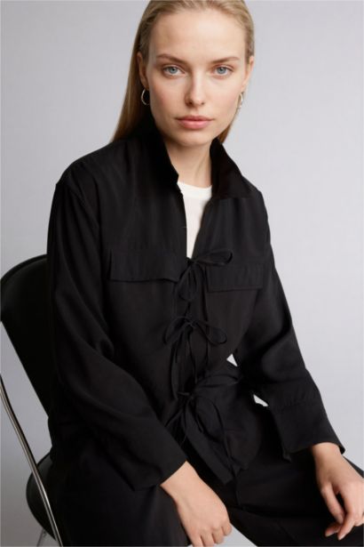 قميص كم طويل قصة عادية