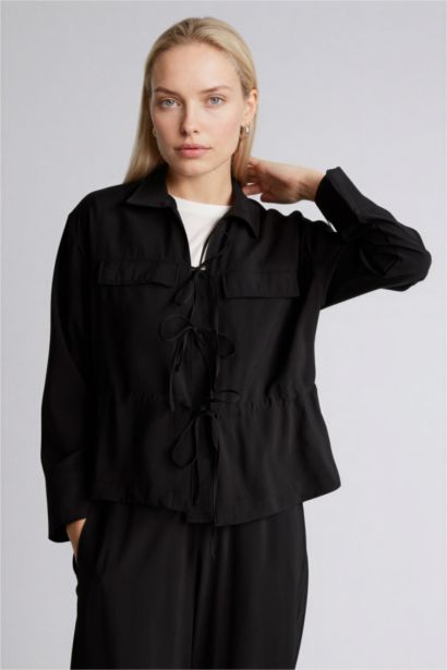 قميص كم طويل قصة عادية