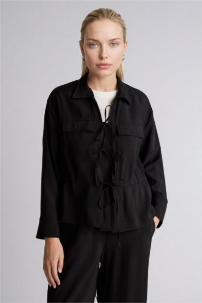 قميص كم طويل قصة عادية