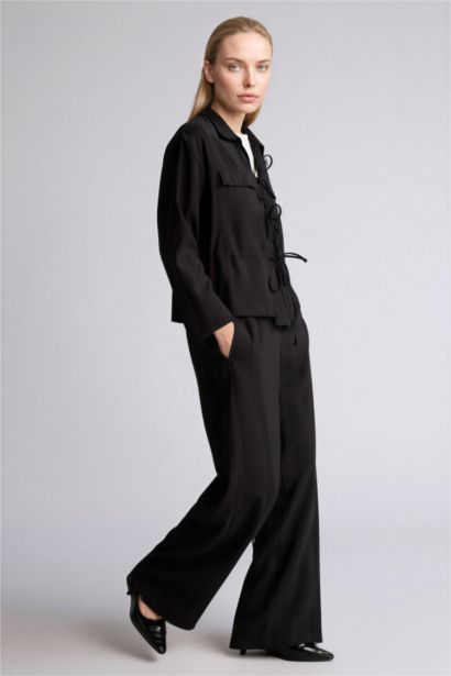 بنطلون منسوج قصة مستقيمة واسعة برجل عادية