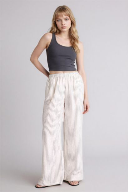 Муслиновые брюки Wide Leg стандартной длины с нормальной посадкой и деталью кармана