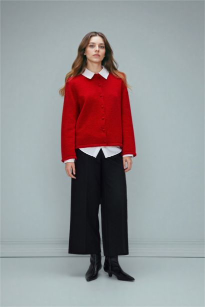 جاكيت تريكو قصة عادية بياخة مستديرة