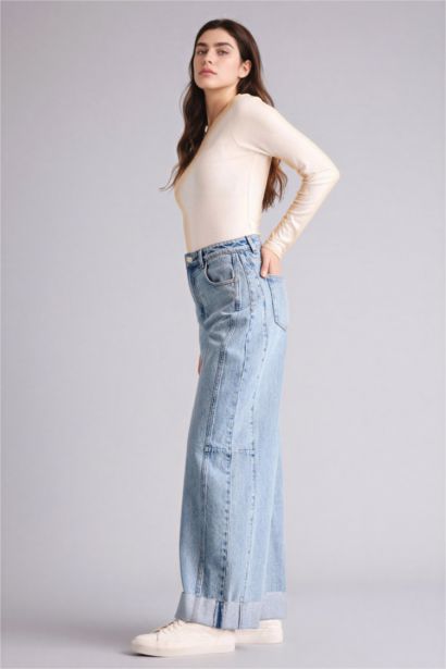 بنطلون جينز باريل فيت وخصر عالي