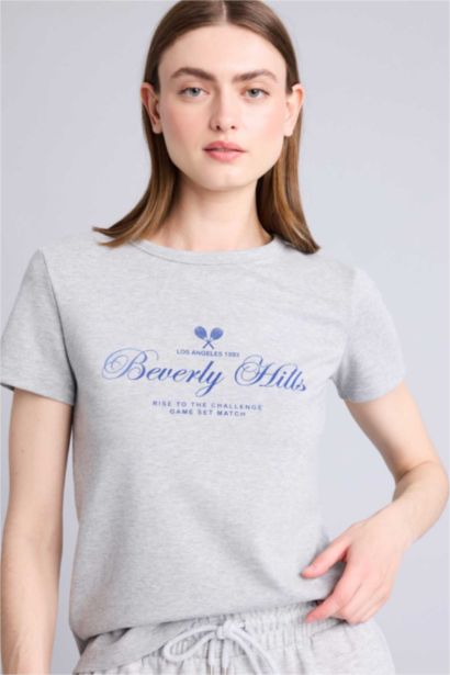 تيشيرت نص كم قصة عادية وياقة مستديرة