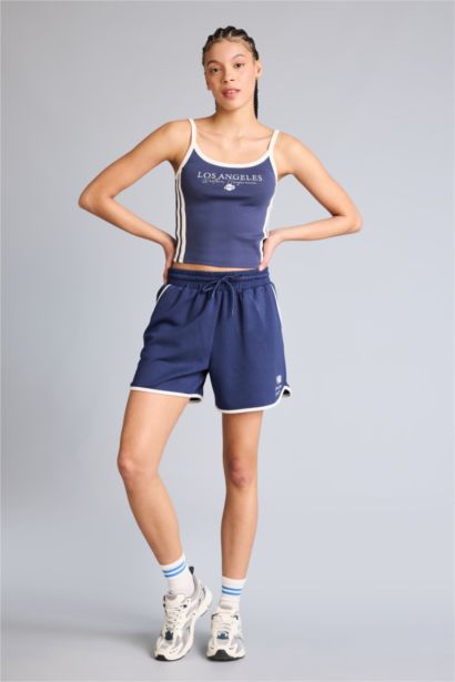 Short de sport NBA Wordmark court en tissu scuba Coupe régulière