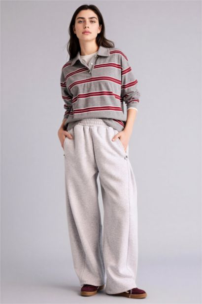 سويت شيرت مخطط قصة فضفاضة بياخة بولو