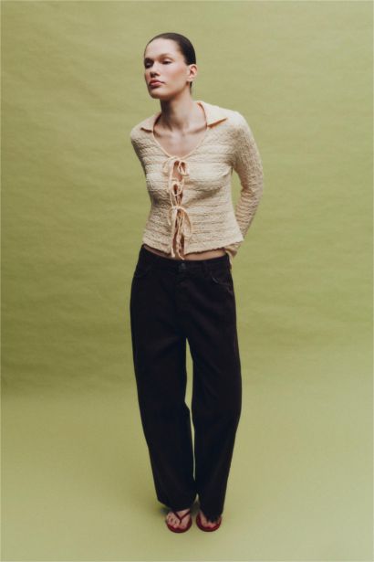 بلوزة كم طويل سليم فيت برباط من الأمام