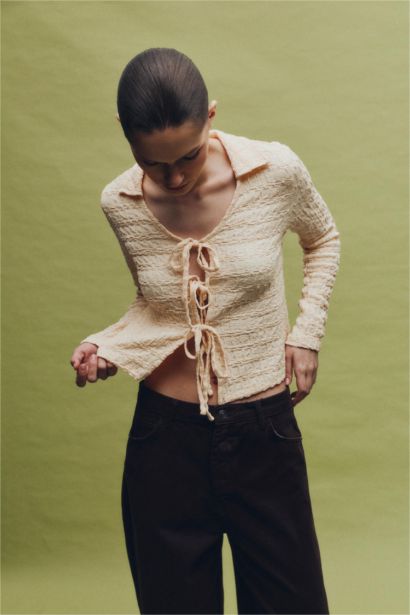 بلوزة كم طويل سليم فيت برباط من الأمام