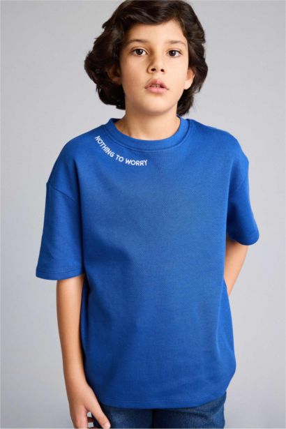 تيشيرت ولادي نص ردن مطرز اوفر سايز