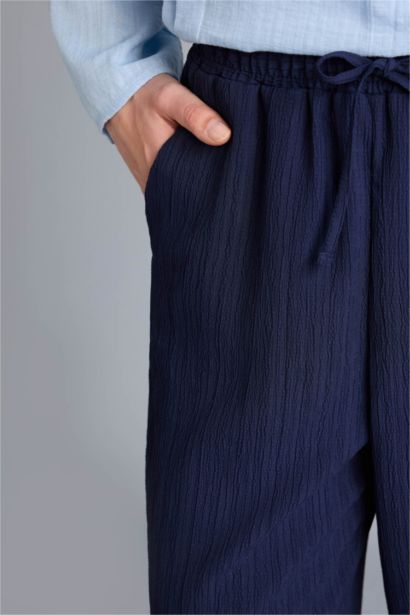 بنطرون منسوج قصة عادية برجل عادي