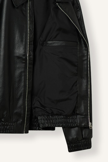 Veste oversize en similicuir à col polo et fermeture éclair