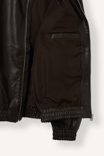 Veste oversize en similicuir à col polo et fermeture éclair