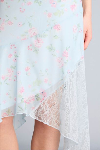 تنورة قصيرة فلورال تول غير متماثل بخصر عادي وبطانة جيرسي