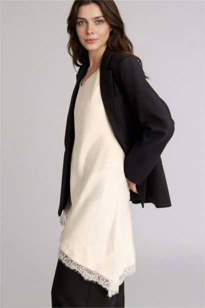 بلوزة طويلة ستان قصة عادية وياخة V