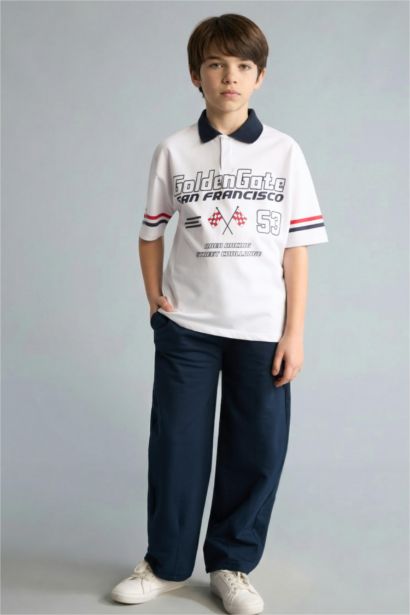 بنطلون اولادي قماش خفيف قصة عادية