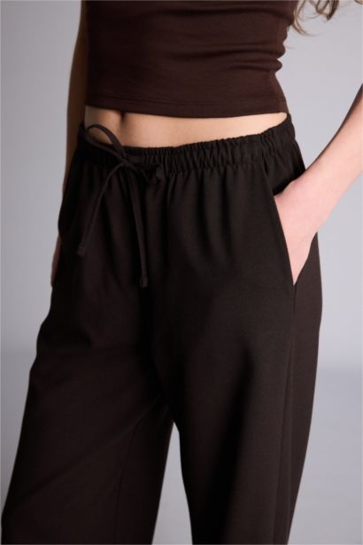 بنطلون وايد ليج برجل واسع بجيب وخصر عادي